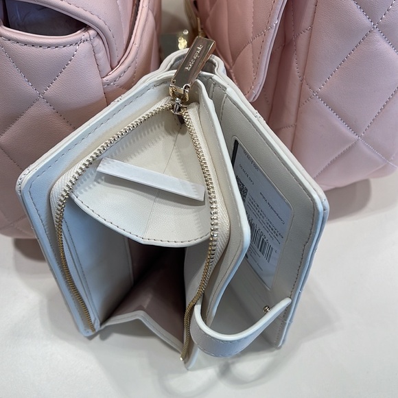 Kate Spade Carey Medium Compartment Bifold Wallet 
COLOR: Parchment - Picture 12 of 16